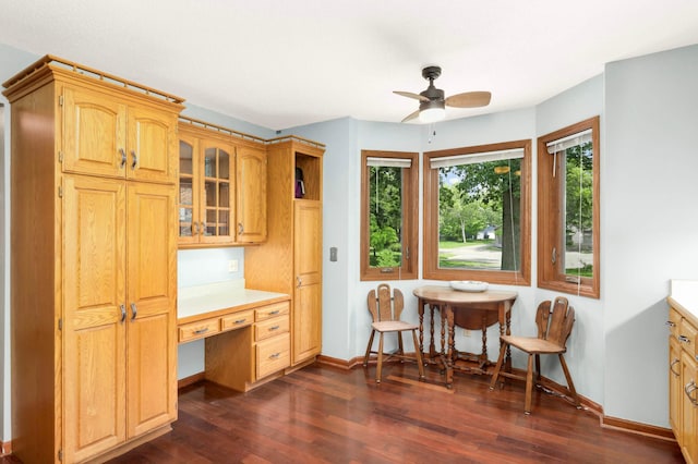 2745 Maplewood Cir, Monticello, MN 55362 - dining room featuring dark wood finished floors, a ceiling fan, and baseboards