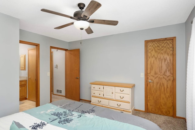 2745 Maplewood Cir, Monticello, MN 55362 - bedroom featuring ensuite bath, light colored carpet, a ceiling fan, and baseboards