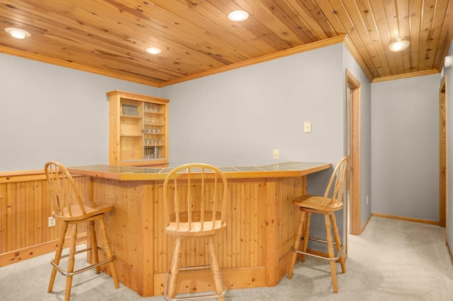 2745 Maplewood Cir, Monticello, MN 55362 - indoor dry bar featuring ornamental molding, light carpet, recessed lighting, and wood ceiling