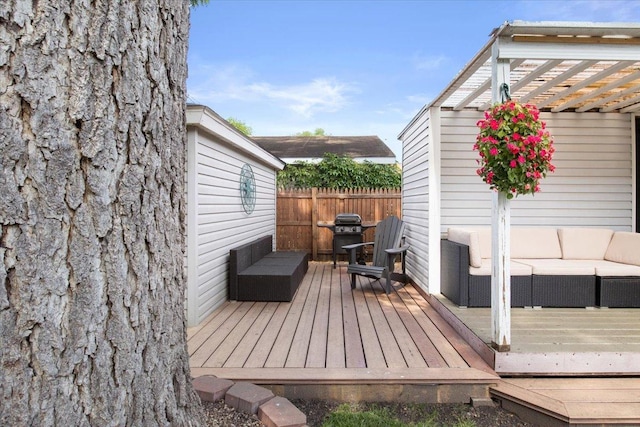 311 Franklin St, Lake City, MN 55041 - wooden terrace with an outdoor living space, area for grilling, and a pergola