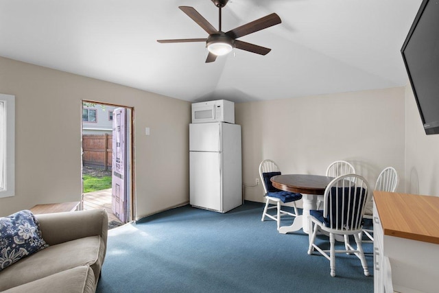 311 Franklin St, Lake City, MN 55041 - dining room featuring ceiling fan, carpet flooring, and vaulted ceiling