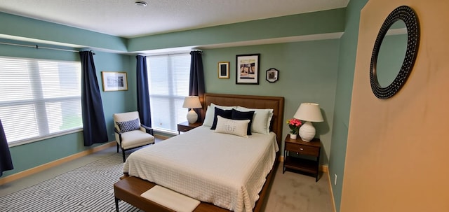 1805 3rd Ave S Unit 102, Minneapolis, MN 55404 - carpeted bedroom featuring multiple windows