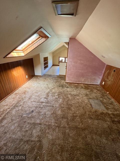 1539 Iglehart Ave, Saint Paul, MN 55104 - bonus room with wood walls, a skylight, carpet flooring, and lofted ceiling