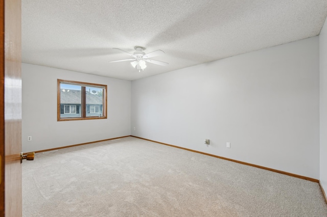 14737 Endicott Way, Apple Valley, MN 55124 - unfurnished room featuring ceiling fan, light carpet, baseboards, and a textured ceiling