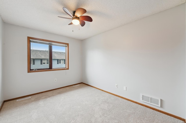 14737 Endicott Way, Apple Valley, MN 55124 - carpeted spare room with baseboards, ceiling fan, and a textured ceiling