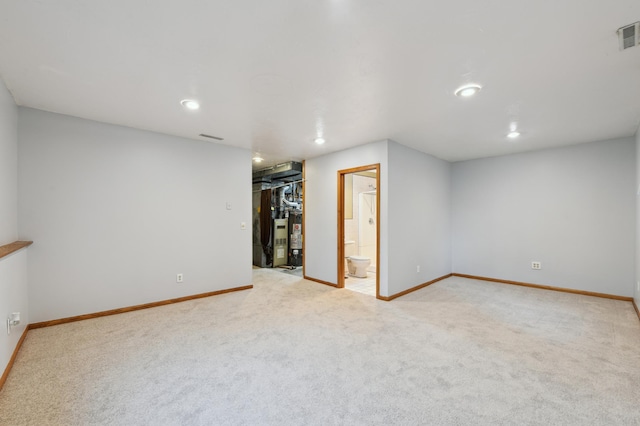 14737 Endicott Way, Apple Valley, MN 55124 - finished basement with carpet flooring, baseboards, recessed lighting, and water heater