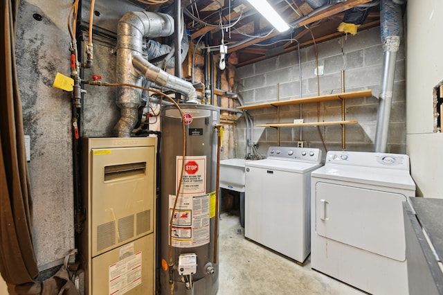 14737 Endicott Way, Apple Valley, MN 55124 - laundry room featuring gas water heater and washer and clothes dryer