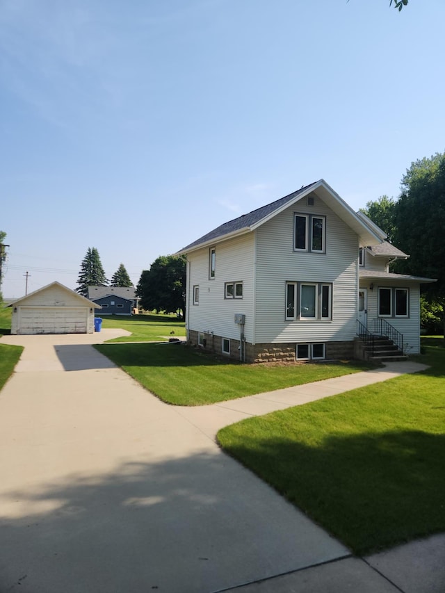 313 2nd St, Hills, MN 56138 - view of property exterior with an outbuilding and a yard