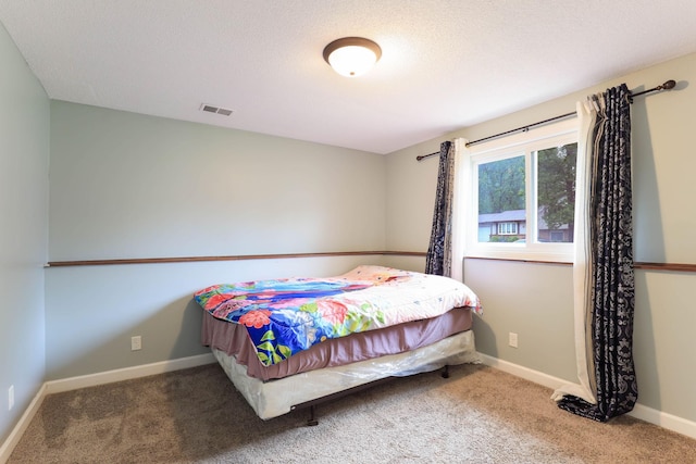 8317 Penn Ave N, Brooklyn Park, MN 55444 - carpeted bedroom with baseboards