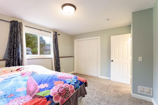8317 Penn Ave N, Brooklyn Park, MN 55444 - bedroom with carpet, a closet, and baseboards