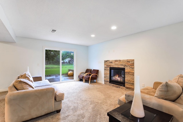 8317 Penn Ave N, Brooklyn Park, MN 55444 - living area featuring carpet flooring, a stone fireplace, recessed lighting, and baseboards