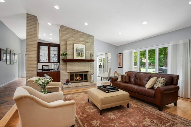 2367 Apache Ct, Mendota Heights, MN 55120 - living area featuring lofted ceiling, a fireplace, and recessed lighting