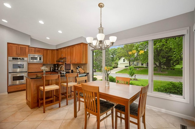 2367 Apache Ct, Mendota Heights, MN 55120 - dining space featuring a chandelier, light tile patterned floors, lofted ceiling, and recessed lighting