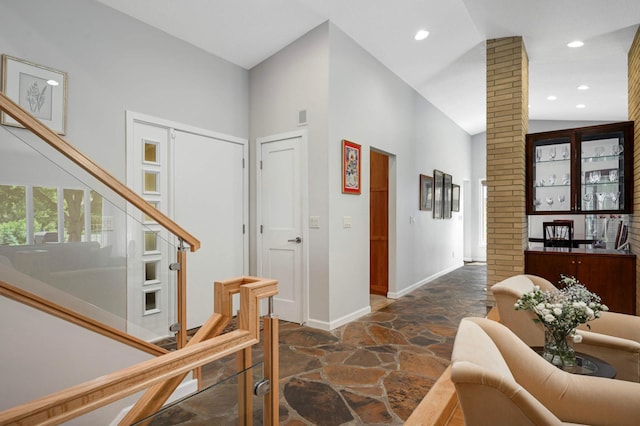 2367 Apache Ct, Mendota Heights, MN 55120 - entryway with dark stone finish floors, stairs, recessed lighting, and high vaulted ceiling