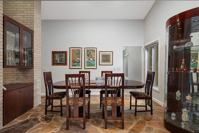 2367 Apache Ct, Mendota Heights, MN 55120 - dining space featuring stone floors and baseboards