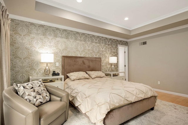 2367 Apache Ct, Mendota Heights, MN 55120 - bedroom with wallpapered walls, light wood-style floors, recessed lighting, crown molding, and a raised ceiling
