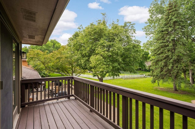 2367 Apache Ct, Mendota Heights, MN 55120 - wooden deck featuring a lawn