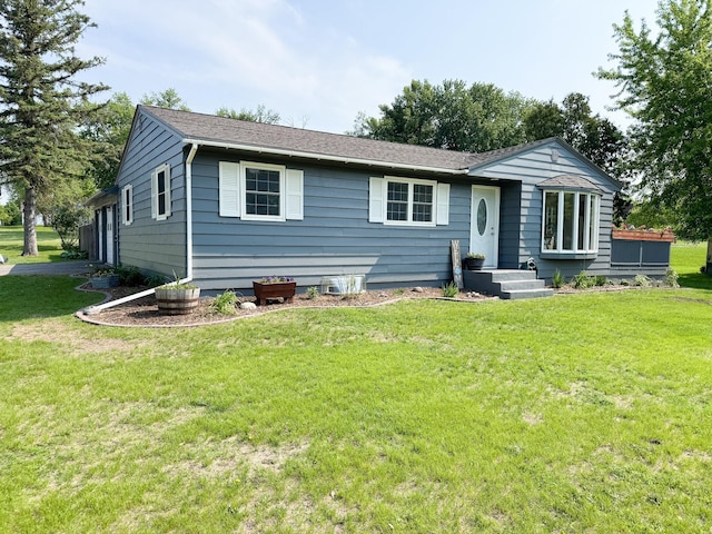 810 Division St, Elbow Lake, MN 56531 - back of property with a yard