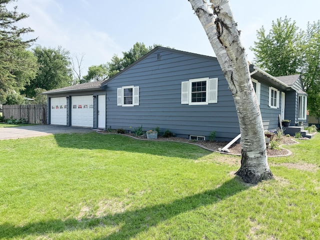 810 Division St, Elbow Lake, MN 56531 - view of property exterior with driveway and an attached garage