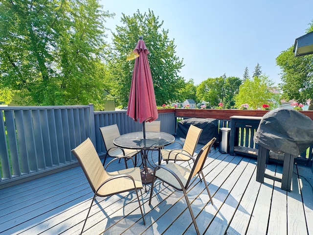 810 Division St, Elbow Lake, MN 56531 - wooden terrace featuring outdoor dining space