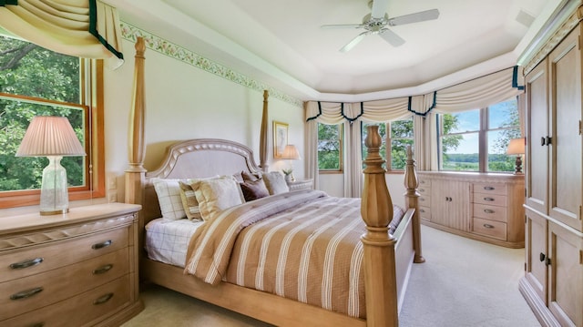 E5110 Interlachen Blvd, Pleasant Valley Twp, WI 54738 - bedroom with light colored carpet, ceiling fan, and a raised ceiling