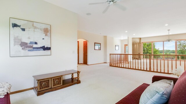 E5110 Interlachen Blvd, Pleasant Valley Twp, WI 54738 - carpeted living room with ceiling fan, arched walkways, baseboards, and recessed lighting