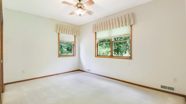 E5110 Interlachen Blvd, Pleasant Valley Twp, WI 54738 - empty room featuring ceiling fan, carpet, and baseboards