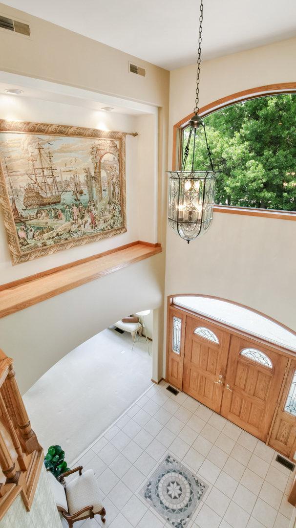E5110 Interlachen Blvd, Pleasant Valley Twp, WI 54738 - foyer with a chandelier and light tile patterned floors
