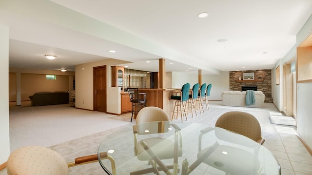 E5110 Interlachen Blvd, Pleasant Valley Twp, WI 54738 - dining space with bar area, light carpet, a fireplace, recessed lighting, and baseboards