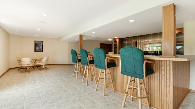 E5110 Interlachen Blvd, Pleasant Valley Twp, WI 54738 - indoor bar featuring baseboards and recessed lighting