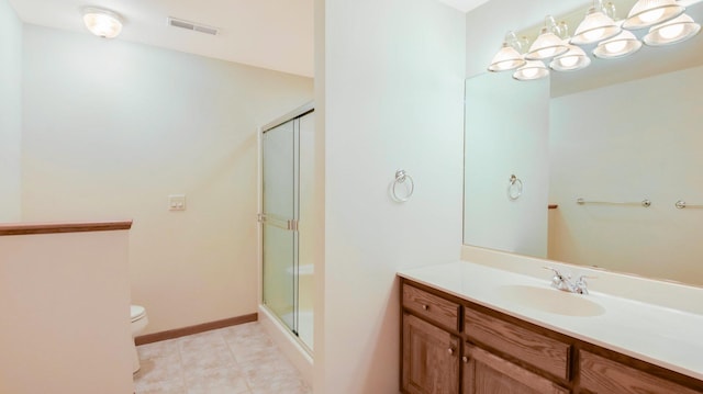 E5110 Interlachen Blvd, Pleasant Valley Twp, WI 54738 - bathroom with toilet, a shower stall, vanity, a chandelier, and tile patterned floors