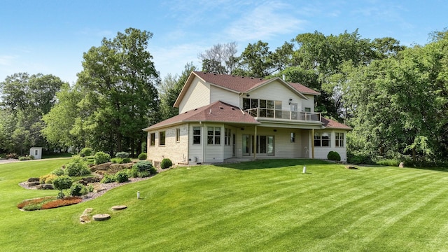 E5110 Interlachen Blvd, Pleasant Valley Twp, WI 54738 - back of house with a balcony, a yard, and roof with shingles