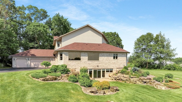 E5110 Interlachen Blvd, Pleasant Valley Twp, WI 54738 - view of side of property featuring a lawn, brick siding, driveway, and roof with shingles