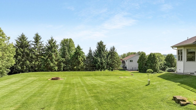 E5110 Interlachen Blvd, Pleasant Valley Twp, WI 54738 - view of green lawn with view of golf course and a fire pit