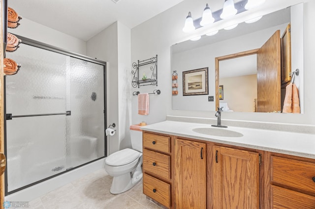 5701 33rd St S, Fargo, ND 58104 - full bath with vanity, a stall shower, toilet, and tile patterned floors