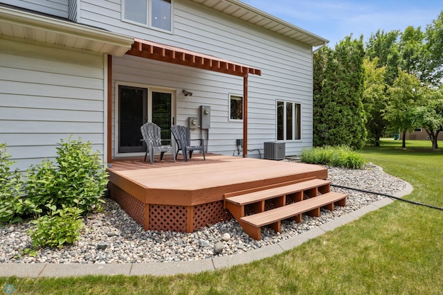 5701 33rd St S, Fargo, ND 58104 - wooden deck featuring cooling unit and a yard