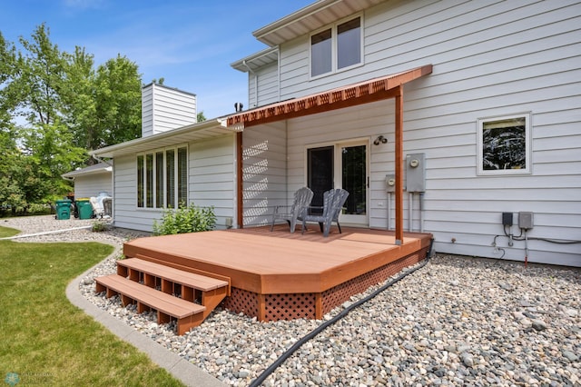 5701 33rd St S, Fargo, ND 58104 - rear view of property with a deck and a chimney