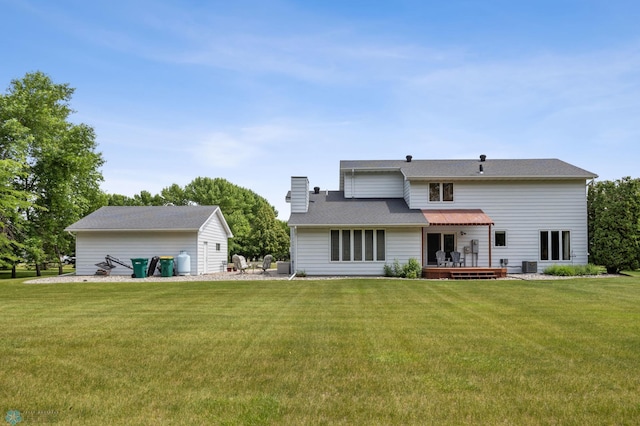5701 33rd St S, Fargo, ND 58104 - rear view of property with a chimney, a lawn, central AC, and a deck