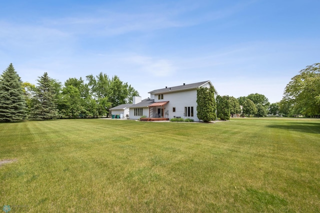 5701 33rd St S, Fargo, ND 58104 - view of grassy yard with a deck