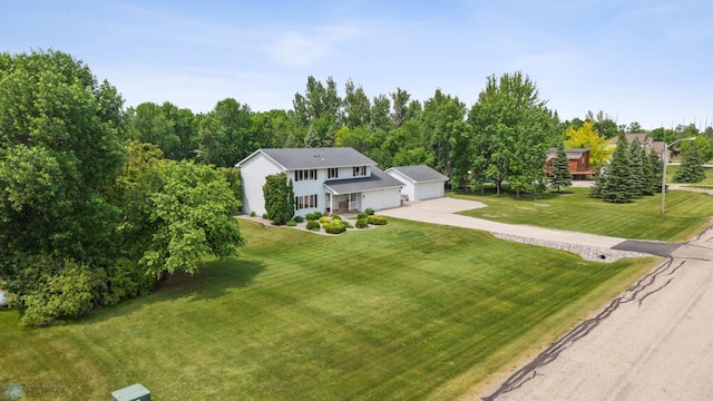 5701 33rd St S, Fargo, ND 58104 - view of front of property with a front lawn, driveway, and an attached garage