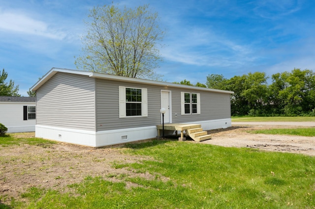 215 Mckay Ave # 42, Alexandria, MN 56308 - view of front of house featuring crawl space and a front yard