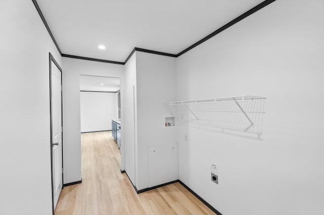 215 Mckay Ave # 42, Alexandria, MN 56308 - laundry area featuring washer hookup, ornamental molding, electric dryer hookup, light wood finished floors, and recessed lighting