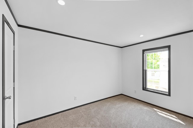 215 Mckay Ave # 42, Alexandria, MN 56308 - unfurnished room featuring ornamental molding, baseboards, carpet floors, and recessed lighting
