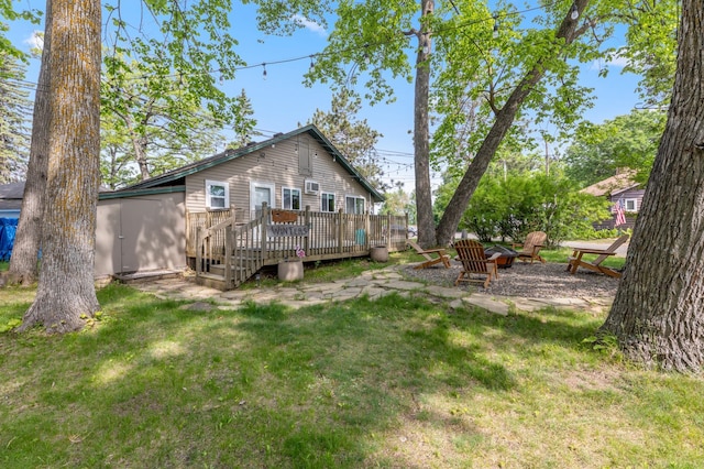 30203 Circle Dr, Breezy Point, MN 56472 - rear view of house with a deck and a yard