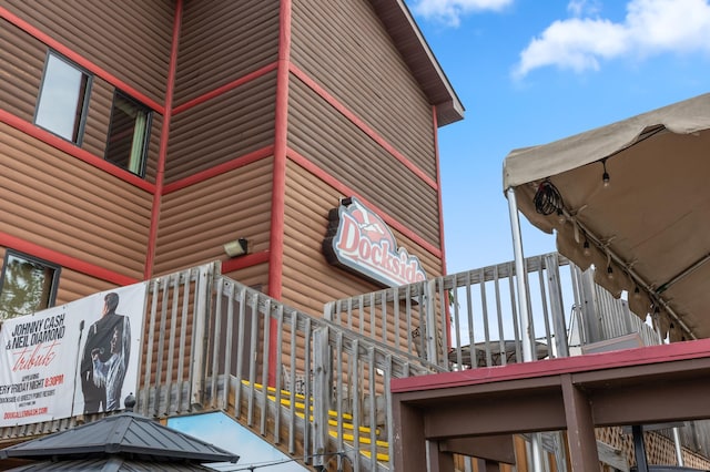 30203 Circle Dr, Breezy Point, MN 56472 - view of home's exterior featuring log veneer siding