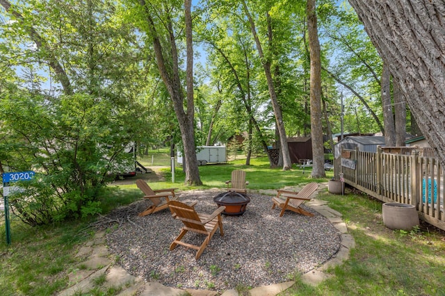 30203 Circle Dr, Breezy Point, MN 56472 - view of yard featuring a fire pit