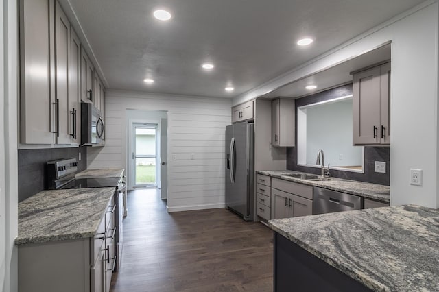 1020 1st St S, Cold Spring, MN 56320 - kitchen with appliances with stainless steel finishes, a sink, dark wood-style flooring, recessed lighting, and stone counters