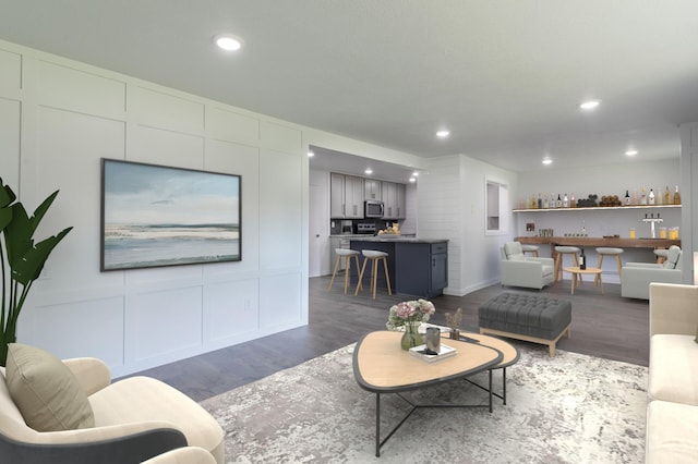 1020 1st St S, Cold Spring, MN 56320 - living room with dark wood-style flooring, recessed lighting, and a decorative wall