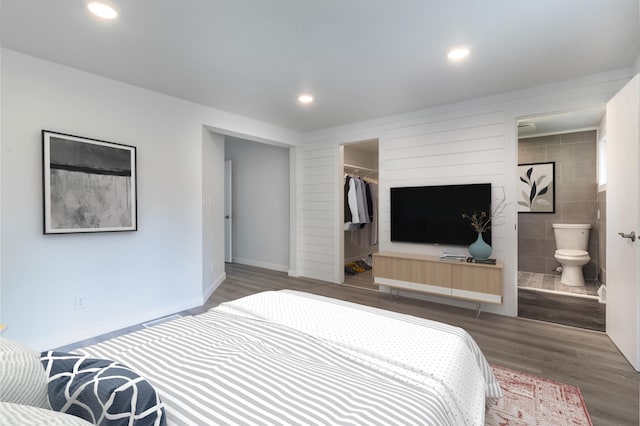 1020 1st St S, Cold Spring, MN 56320 - bedroom featuring wood finished floors, a walk in closet, recessed lighting, connected bathroom, and a closet
