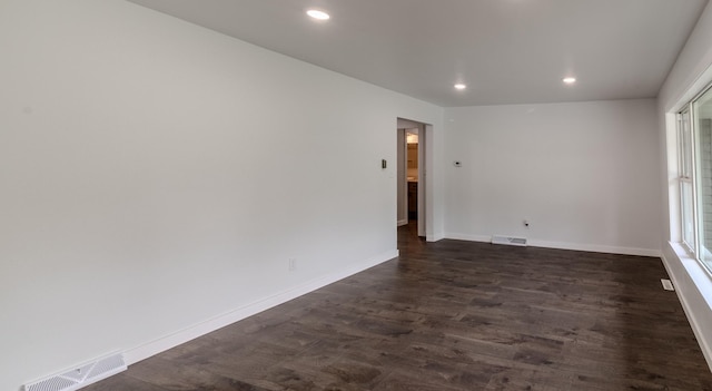 1020 1st St S, Cold Spring, MN 56320 - unfurnished room featuring recessed lighting, dark wood-style floors, and baseboards